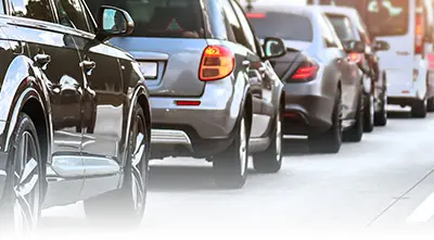 Traffic jam with multiple cars on road
