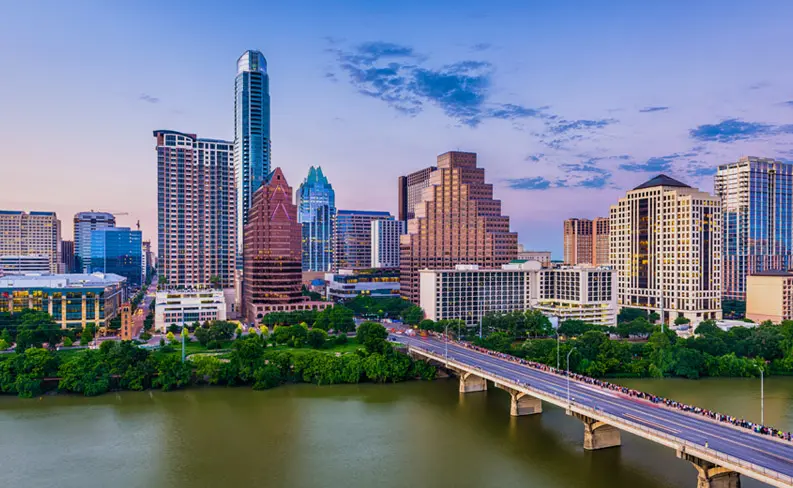 Austin skyline and river at sunset